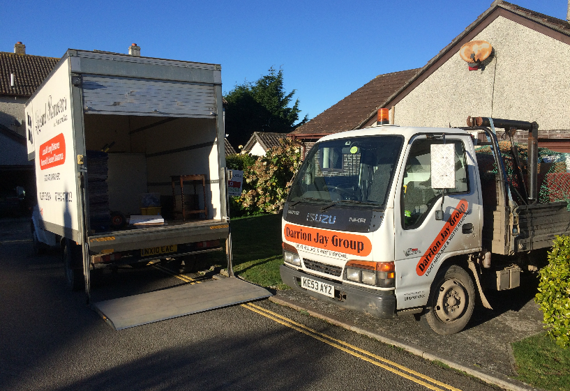 A photo showing DJ Group van clearing a house