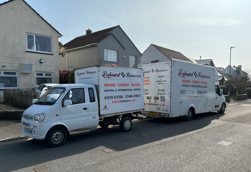An image of a Narrow Vehicle receiving items from a normal sized van