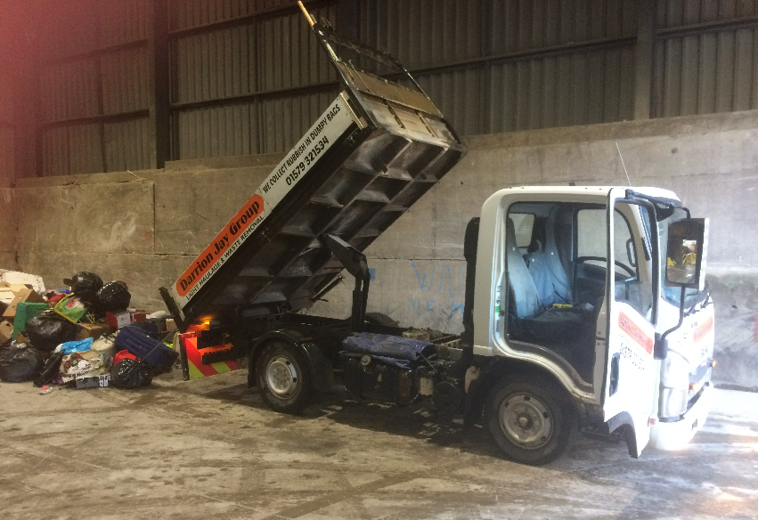 A picture of truck releaseing waste effectively