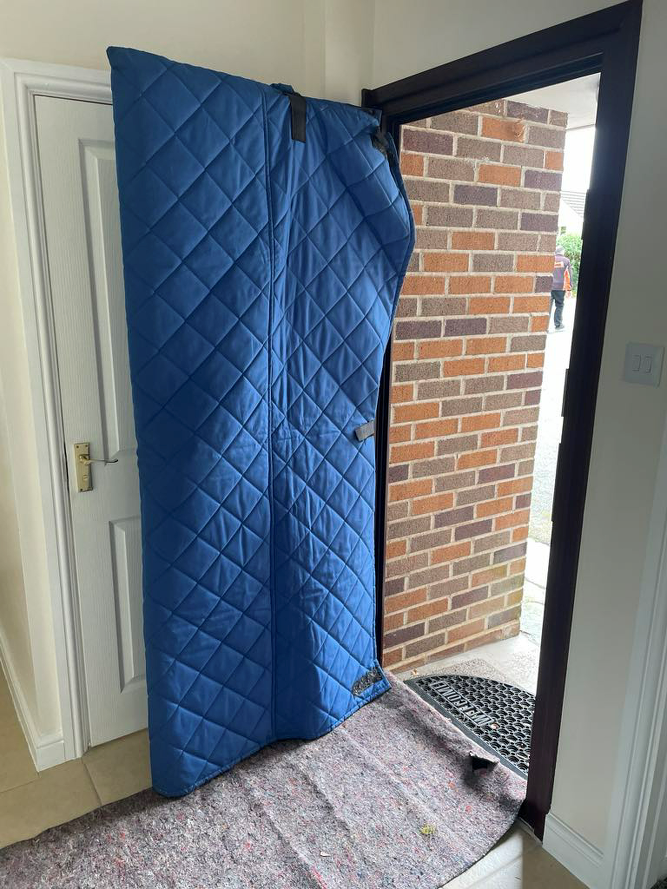 An image showing the waterproof cover for items being moved